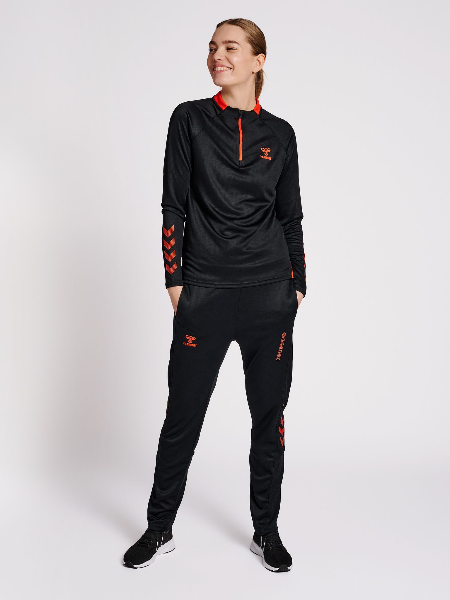 hmlGG12 ACTION HALF ZIP SWEAT WOMAN