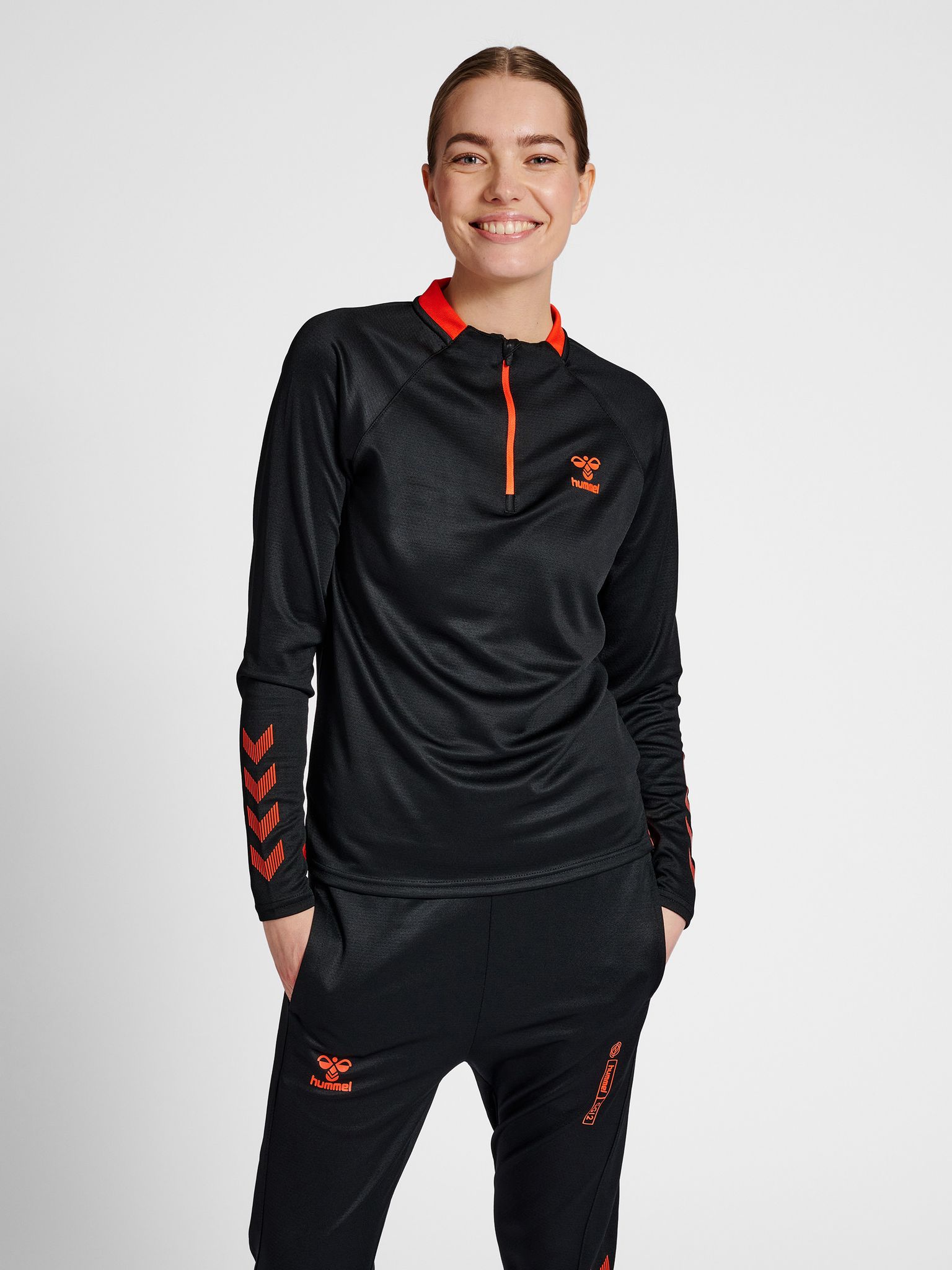 hmlGG12 ACTION HALF ZIP SWEAT WOMAN