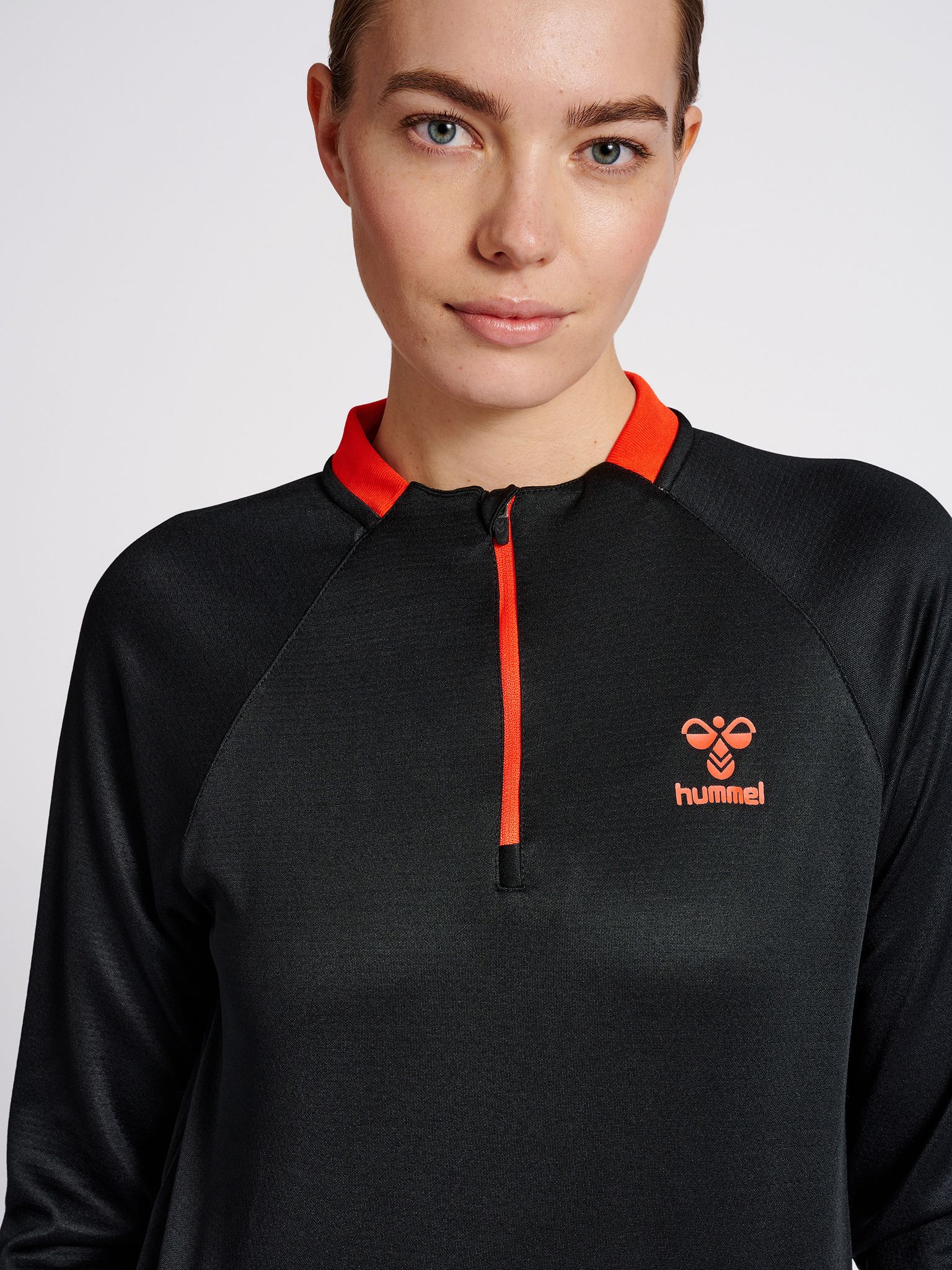 hmlGG12 ACTION HALF ZIP SWEAT WOMAN